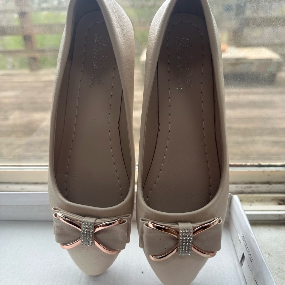 Women's Beige Pointed-Toe Flats with Bow Accent